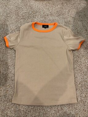 VICI Beige Ribbed Tee with Bright Orange Trim